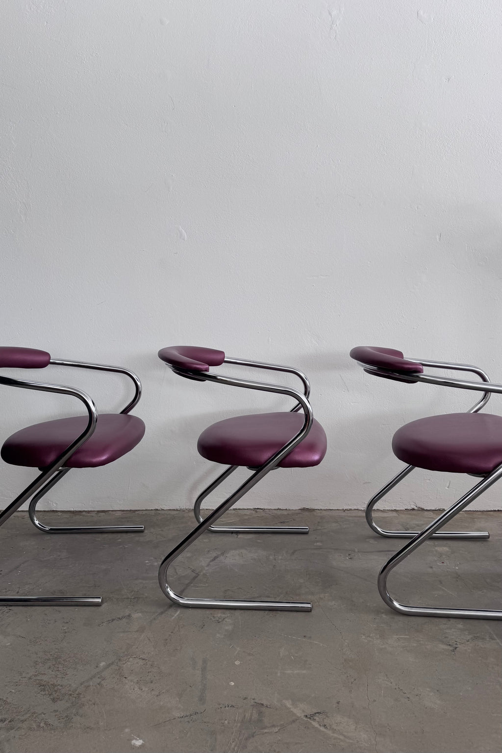 Set of 4 Cantilever Chairs · 1970s · Chrome Frame · Metallic Aubergine Faux Leather · Vintage Space Age