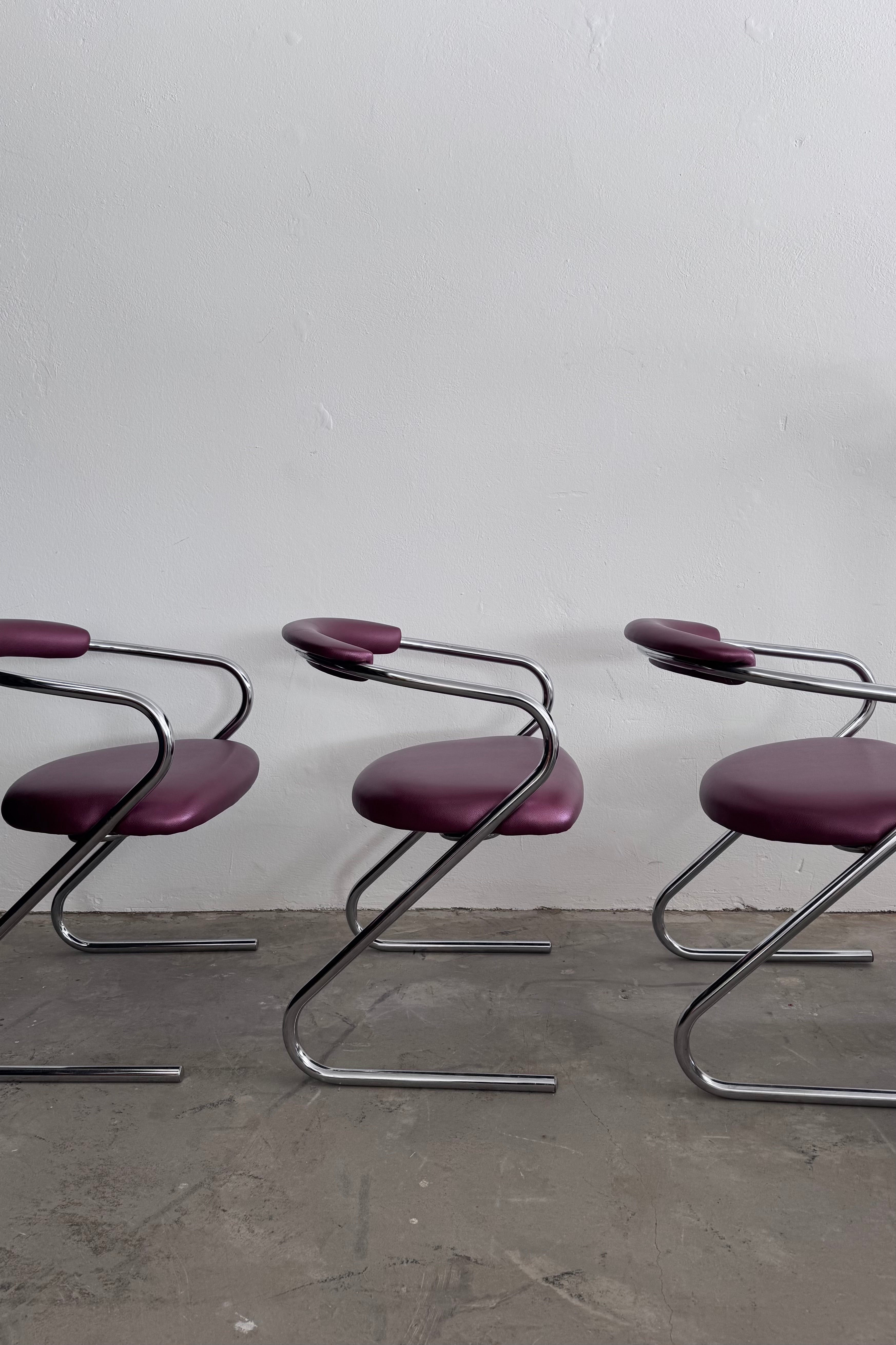 Set of 4 Cantilever Chairs · 1970s · Chrome Frame · Metallic Aubergine Faux Leather · Vintage Space Age