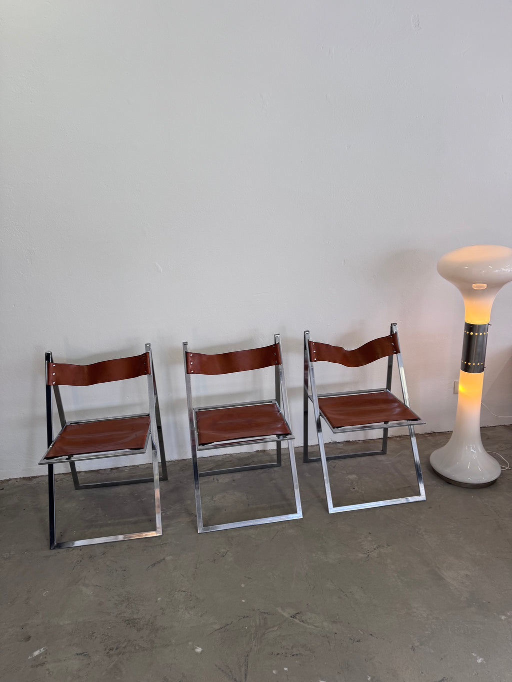 Vintage „Elios“ Klappstühle von Fontoni  Geraci für Lübke Cognac Sattelleder & Chrom – Mid-Century Modern – Restauriert