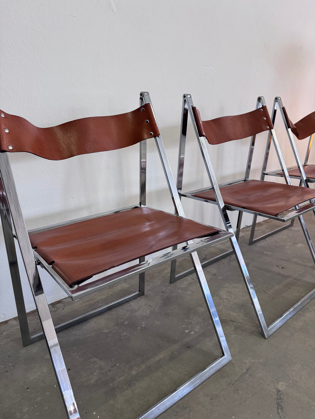 Vintage „Elios“ Klappstühle von Fontoni  Geraci für Lübke Cognac Sattelleder & Chrom – Mid-Century Modern – Restauriert