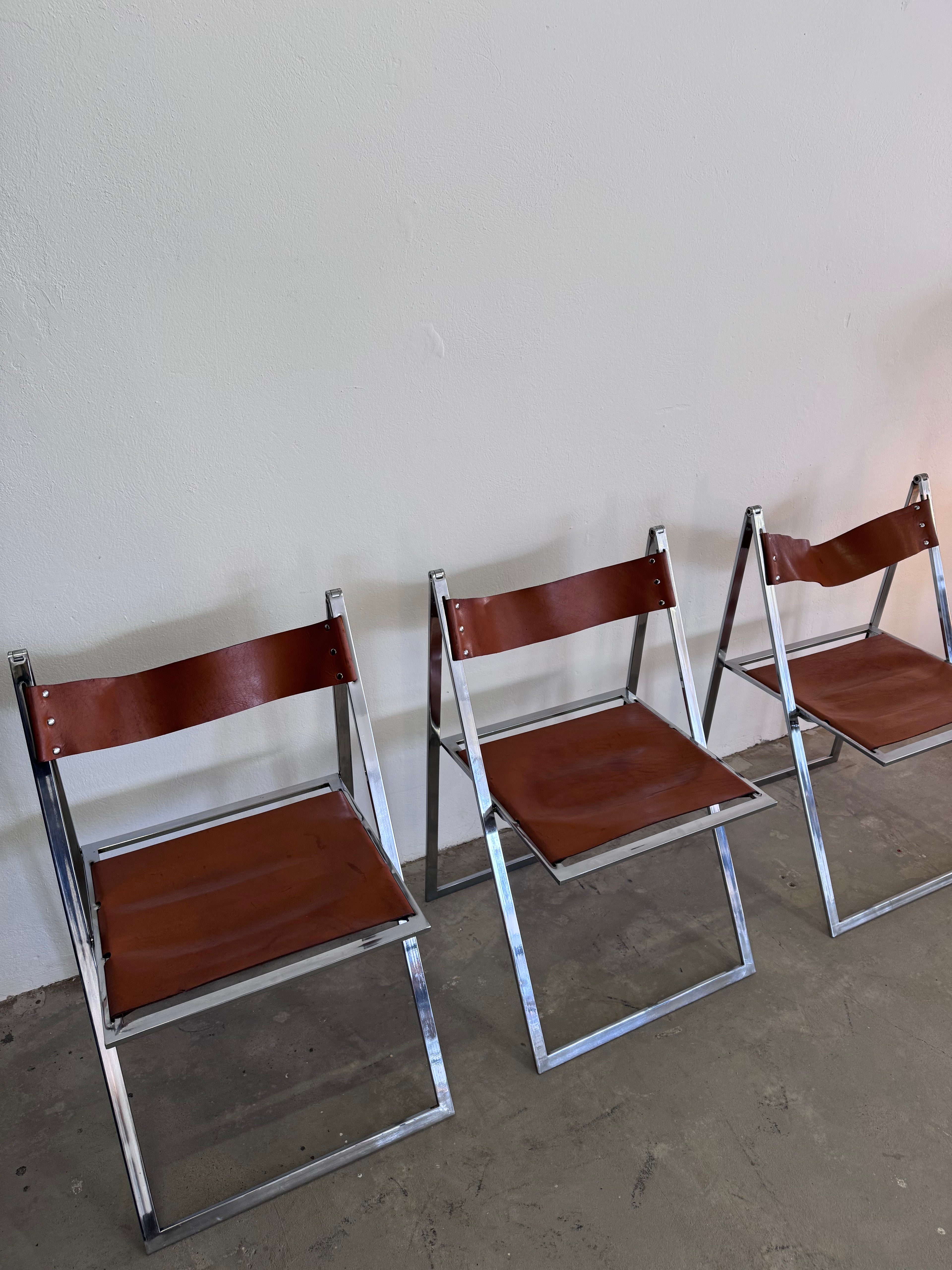 Vintage „Elios“ Klappstühle von Fontoni  Geraci für Lübke Cognac Sattelleder & Chrom – Mid-Century Modern – Restauriert