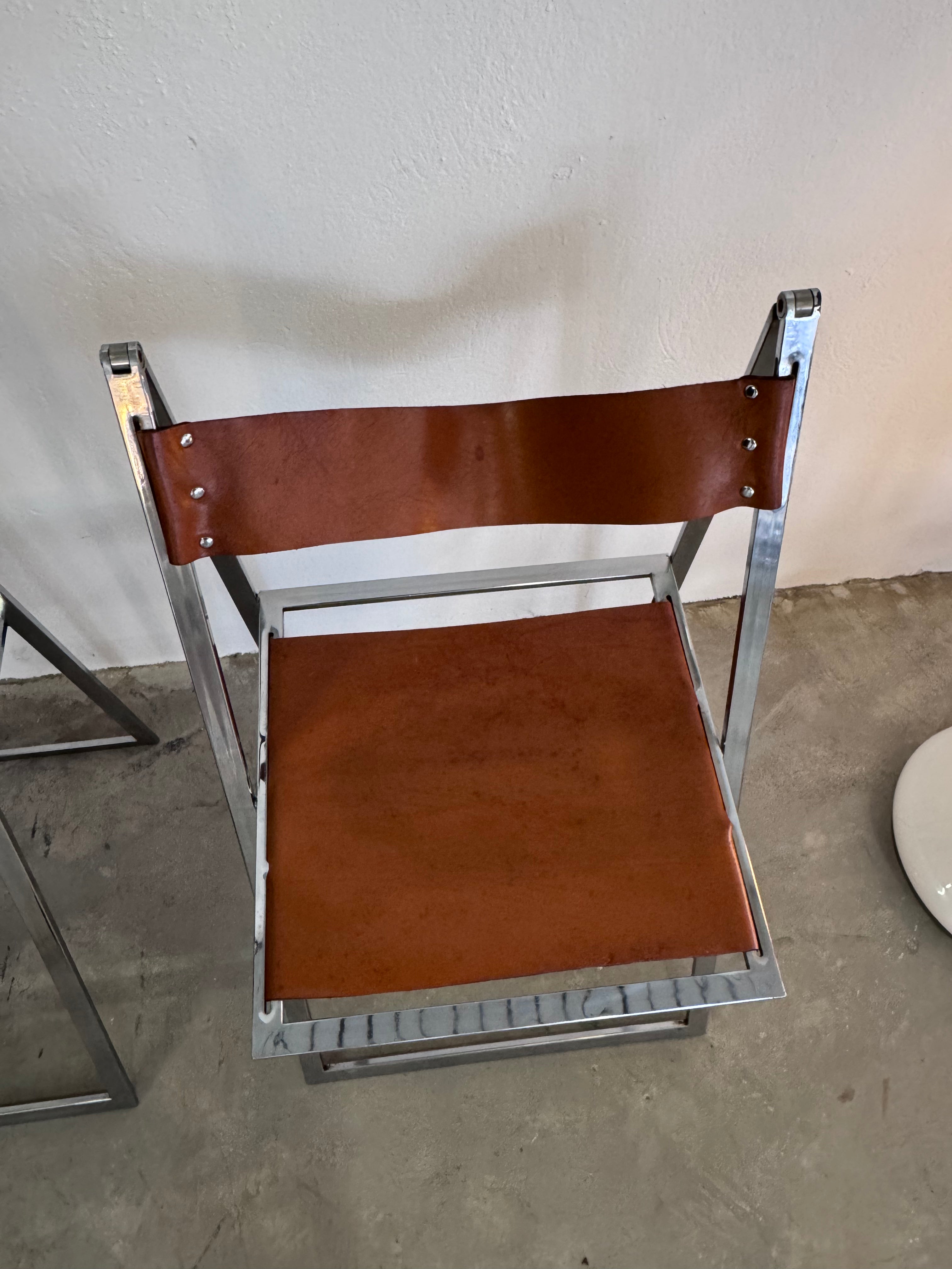 Vintage „Elios“ Klappstühle von Fontoni  Geraci für Lübke Cognac Sattelleder & Chrom – Mid-Century Modern – Restauriert