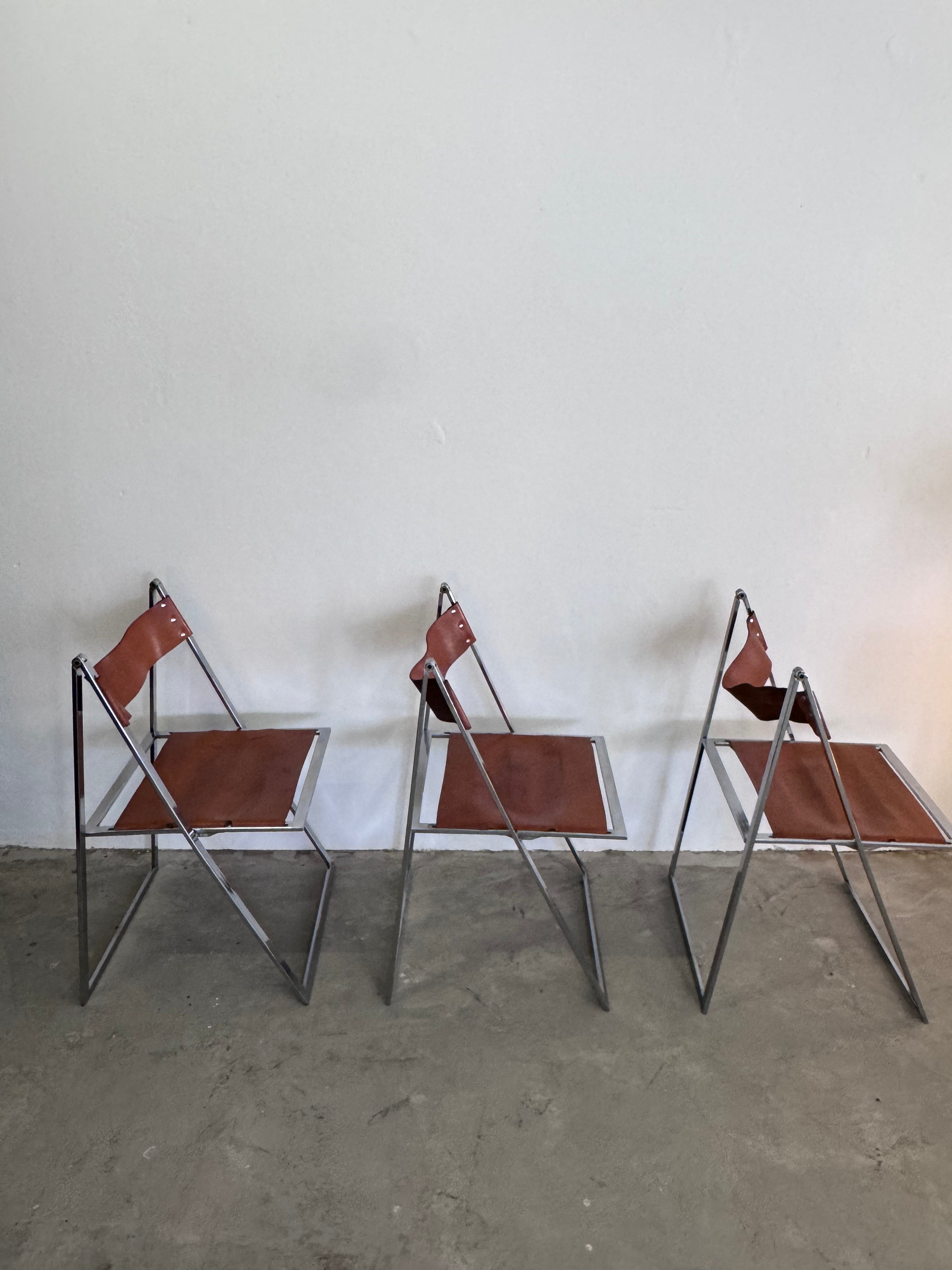 Vintage „Elios“ Klappstühle von Fontoni  Geraci für Lübke Cognac Sattelleder & Chrom – Mid-Century Modern – Restauriert
