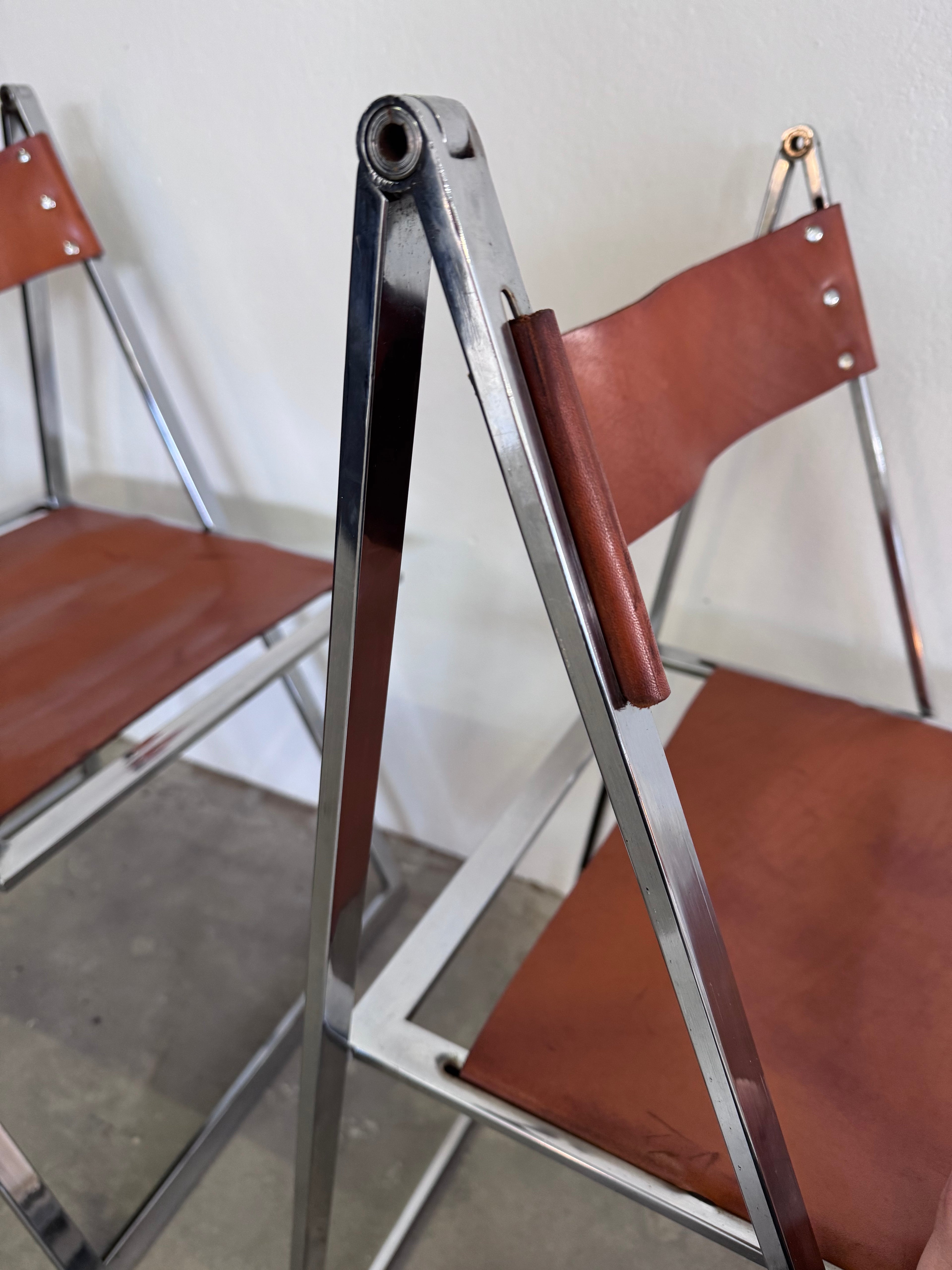 Vintage „Elios“ Klappstühle von Fontoni  Geraci für Lübke Cognac Sattelleder & Chrom – Mid-Century Modern – Restauriert