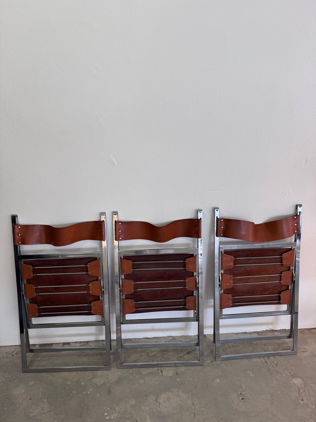 Vintage „Elios“ Klappstühle von Fontoni  Geraci für Lübke Cognac Sattelleder & Chrom – Mid-Century Modern – Restauriert
